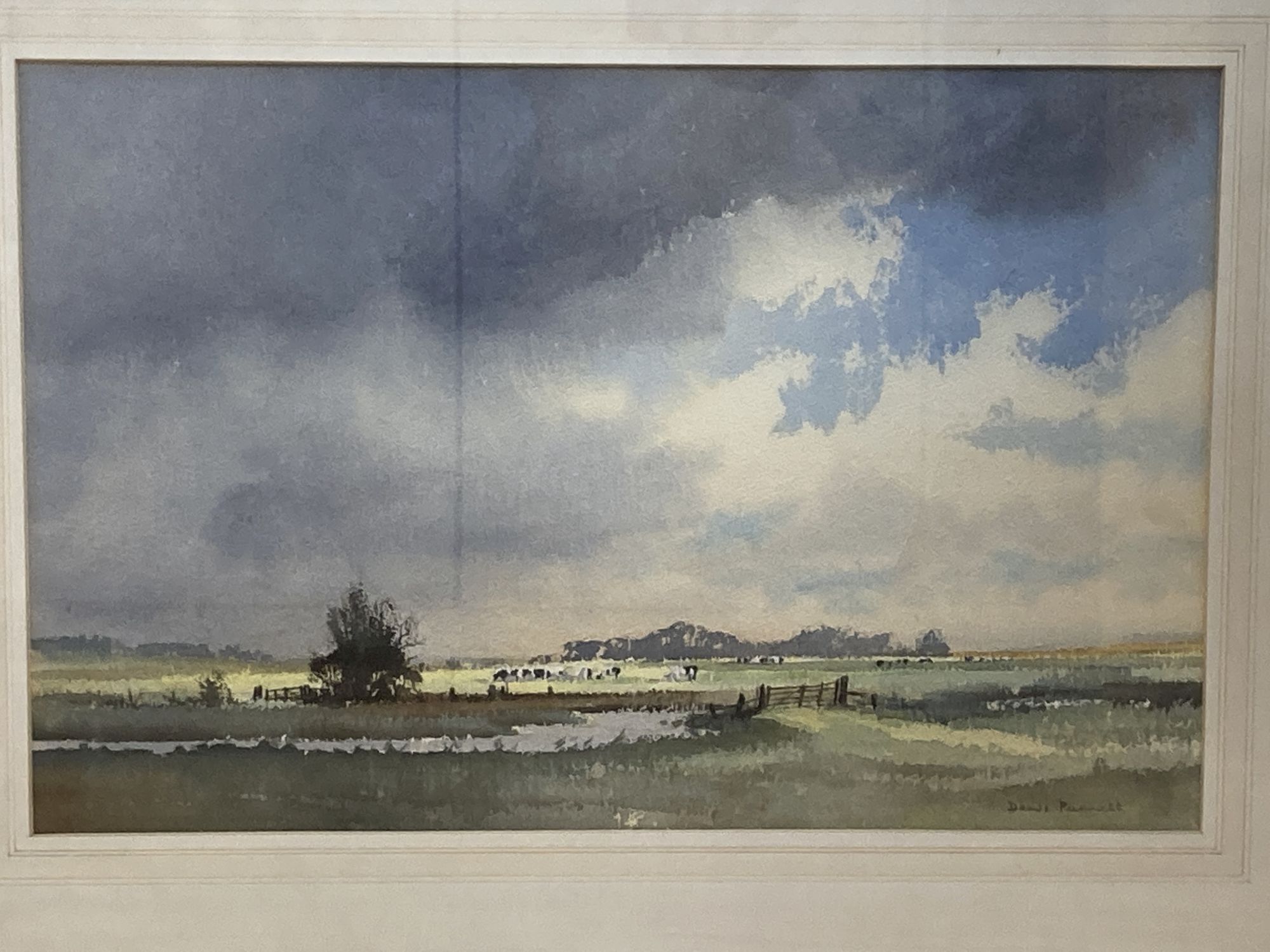 Dennis Pannett (1939-), two watercolours, Cattle in a landscape and Farmhouse beneath clouds, signed, 35 x 54cm